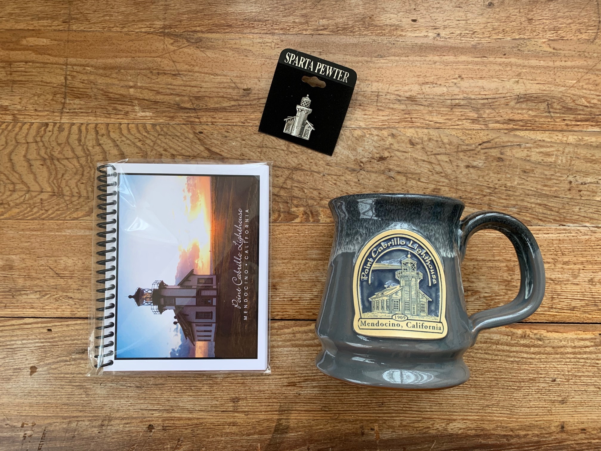 mugs-and-notebooks-pins-lighthouse-mendocino